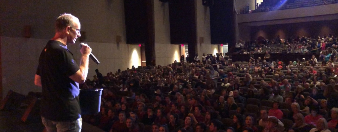 Damon Brown, Outreach Coordinator of Thirst, speaking to the audience during the Thirst Project's Miracle Minutes.