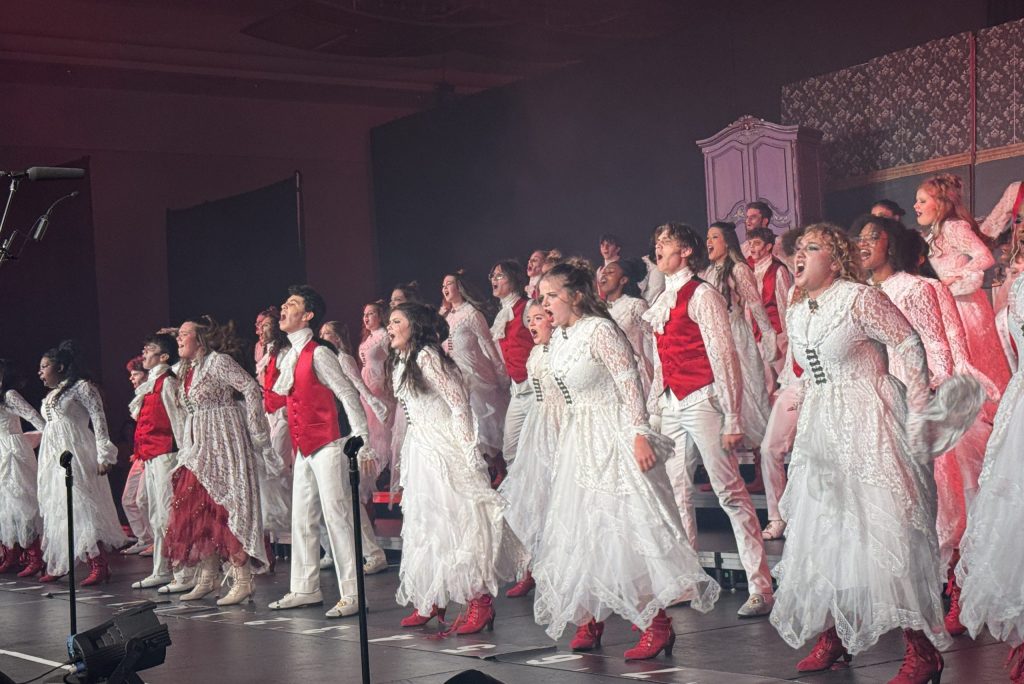 Voices of Central from Keller Central High School performing on stage