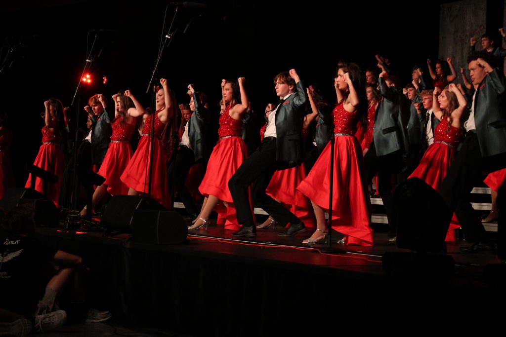 Synergy from Johnston High School performing on stage