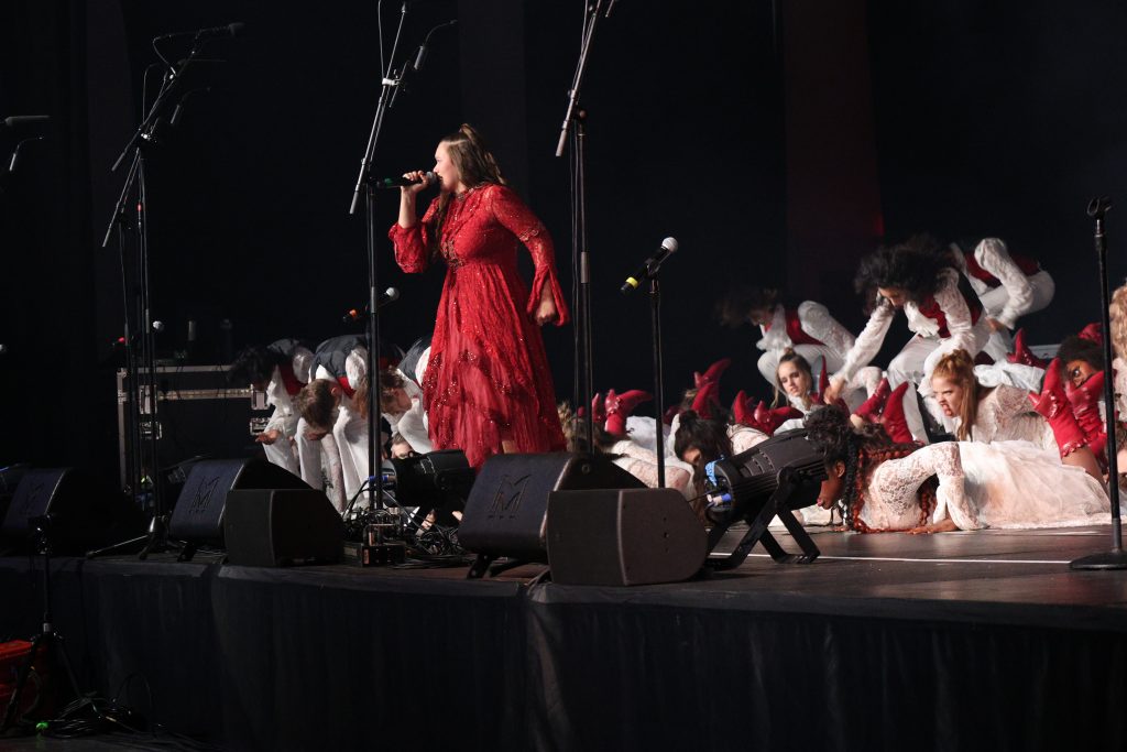 Voices of Central from Keller Central High School performing on stage