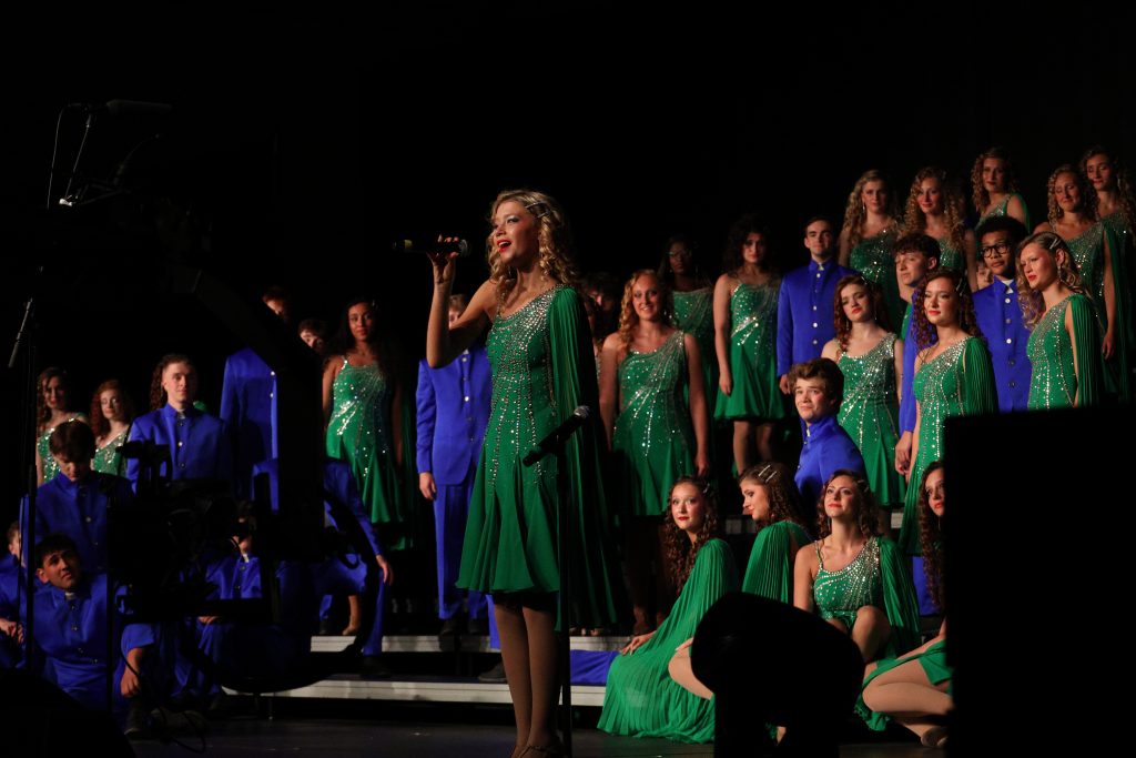 The Amazing Technicolor Show Choir from Omaha Westside High School performing on stage