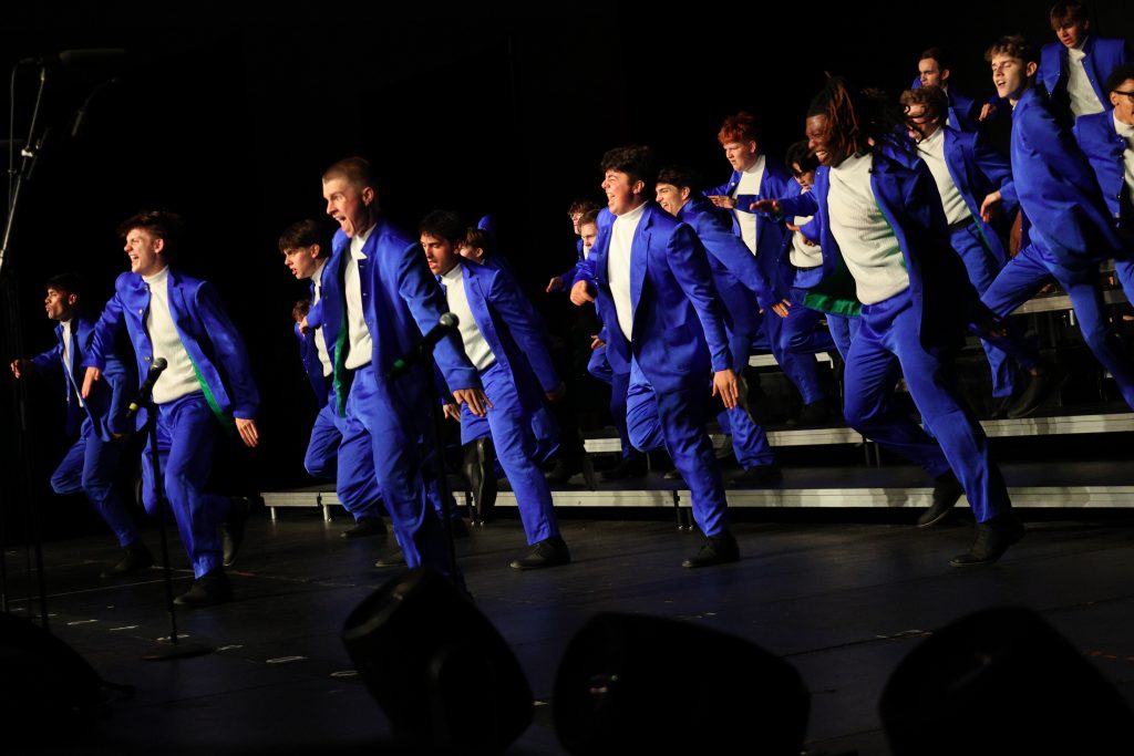 The Amazing Technicolor Show Choir from Omaha Westside High School performing on stage