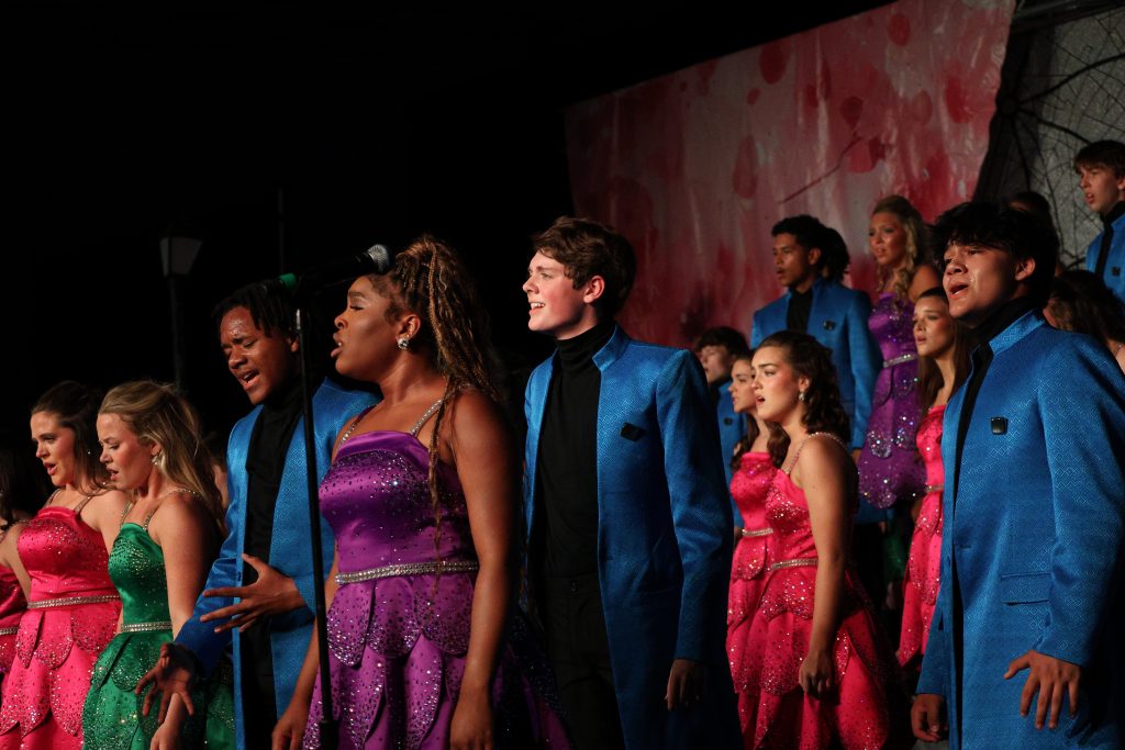 Reveille from Madison Central High School performing on stage