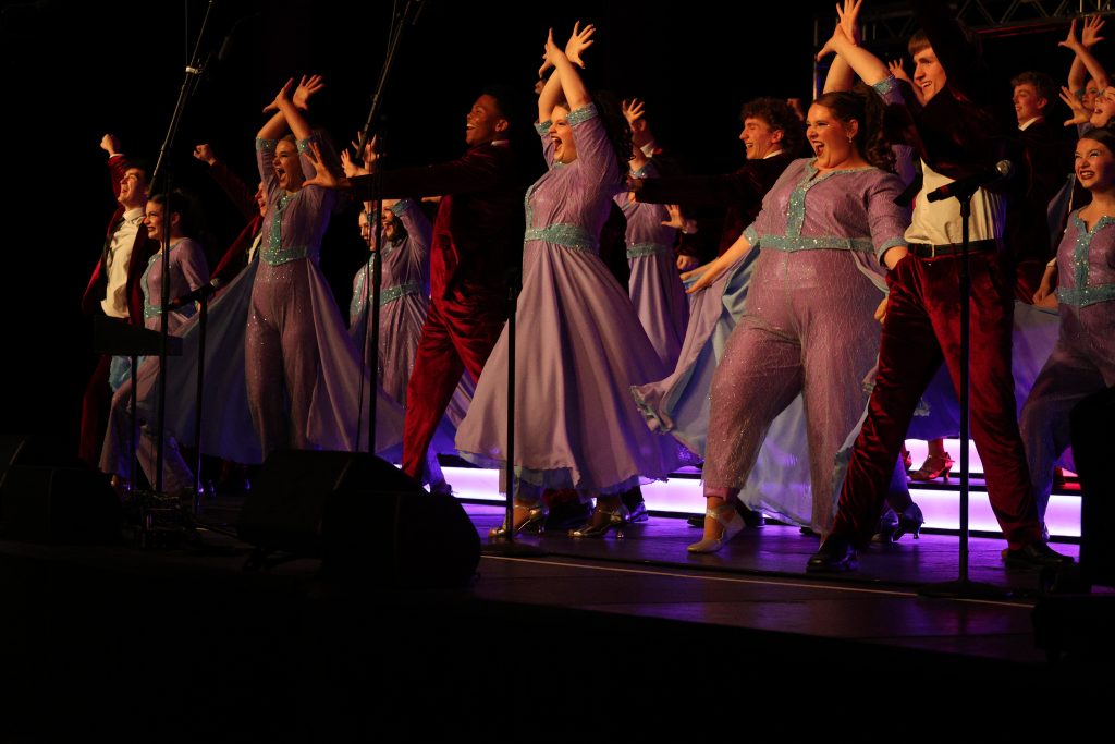 Varsity Singers from Huntington North High School performing on stage