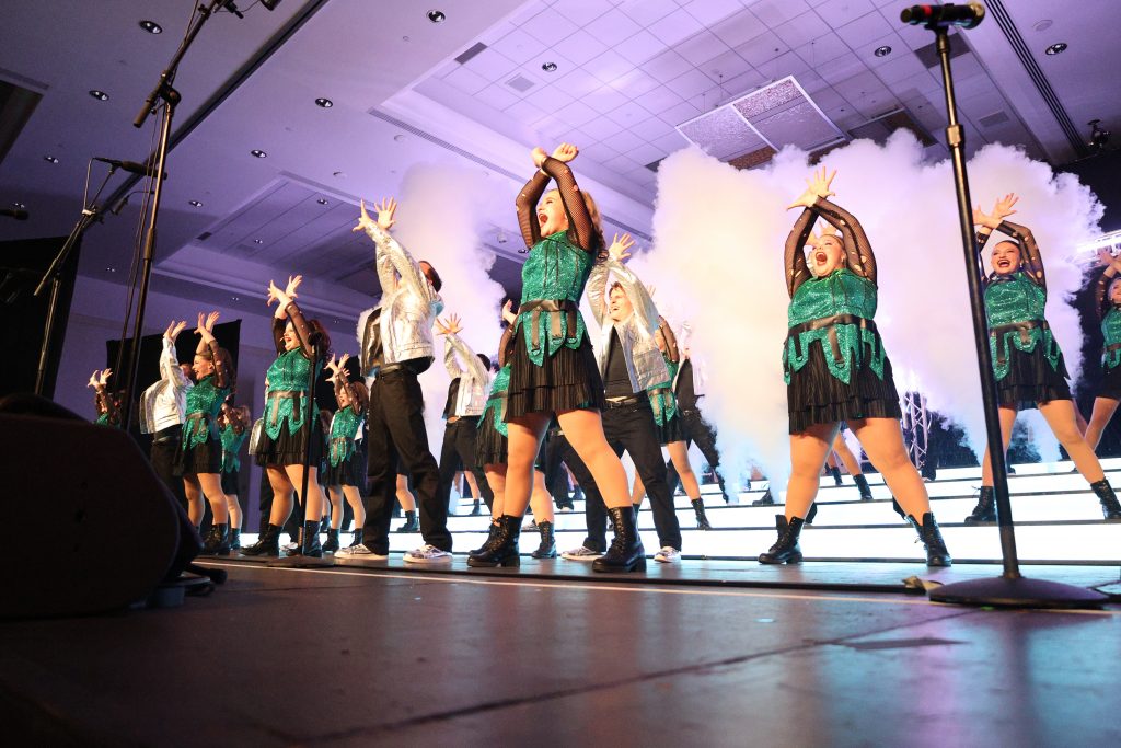 Varsity Singers from Huntington North High School performing on stage