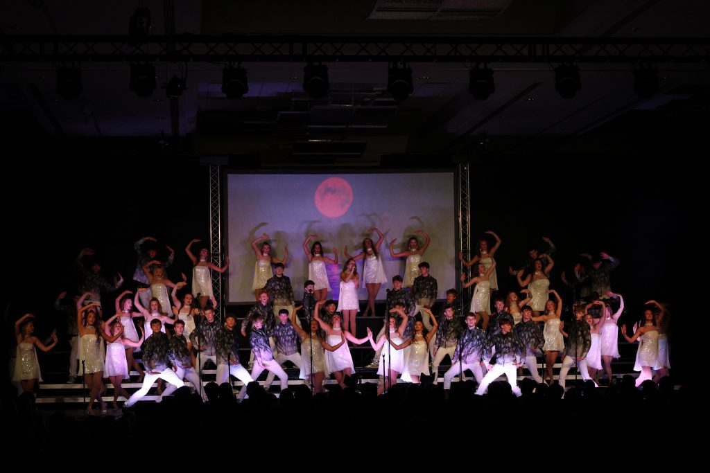 Innovation from Johnston High School performing on stage