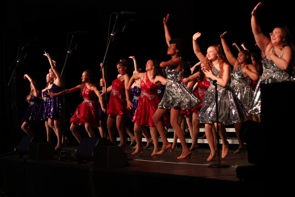 Simply Irresistible from Omaha Westside High School performing on stage