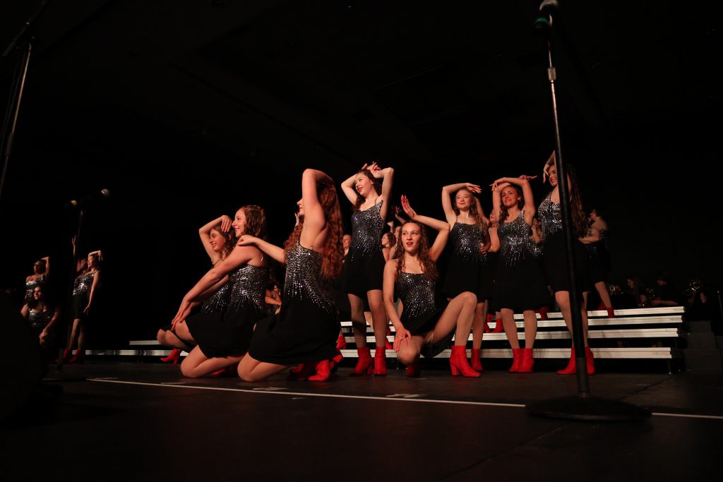 Simply Irresistible from Omaha Westside High School performing on stage