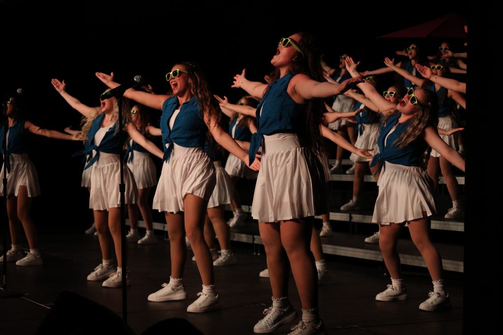 Les Femmes from Mt. Zion High School performing on stage