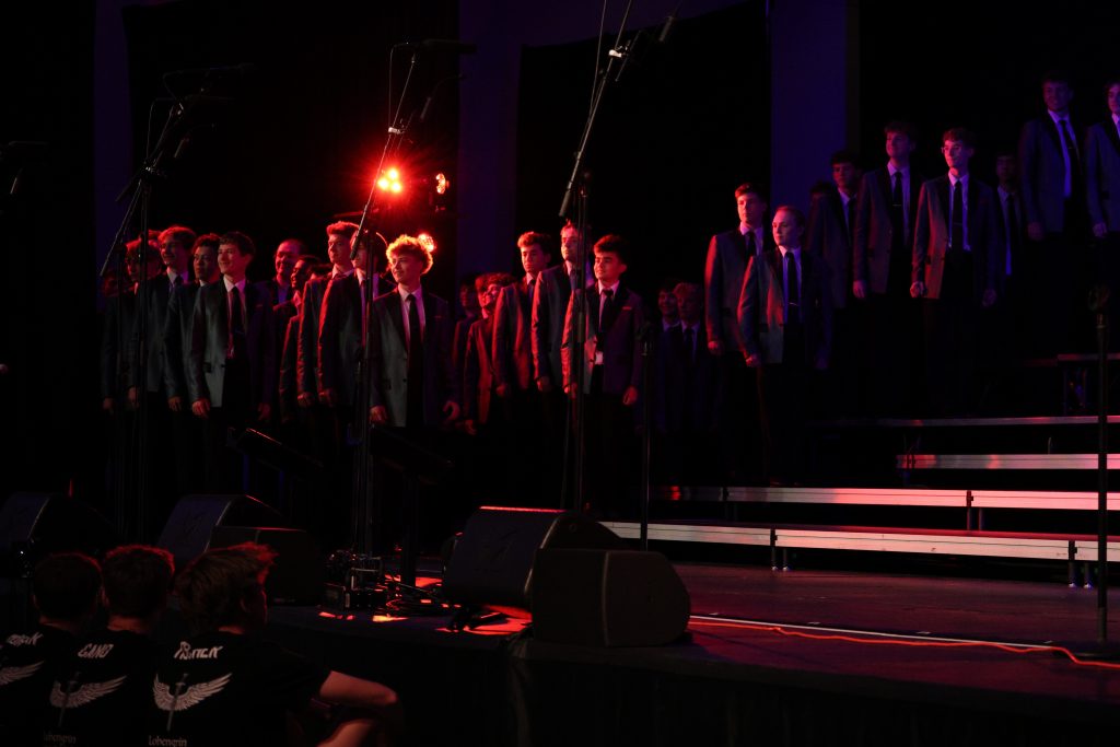 Synergy from Johnston High School performing on stage